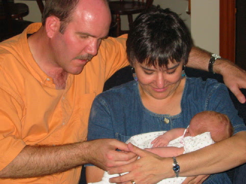 Sept 1 2002 - Aunt Katie and Uncle Don holding Jane